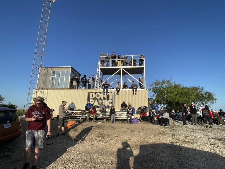 Guests on the two-level viewing platform on top of the DON'T PANIC container at the Rocket Ranch Outpost
