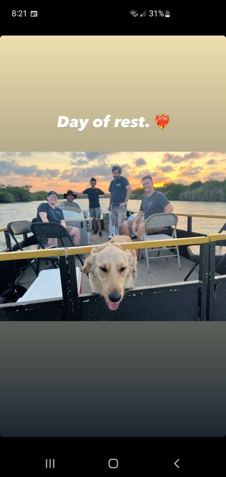 Guests and a dog on a Rocket Ranch pontoon boat at sunset on the Rio Grande
