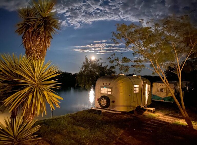 Vintage trailers by moonlight on the Rio Grande at the Rocket Ranch campground