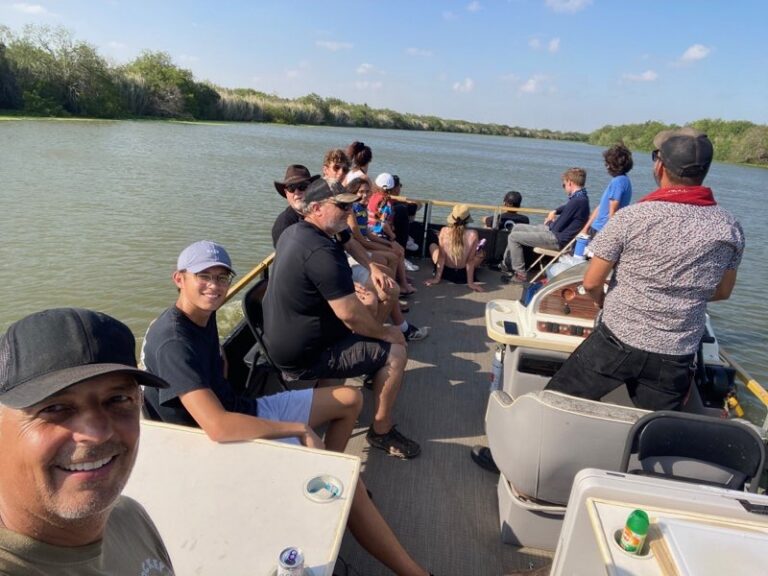 Guests on a Rocket Ranch boat tour of the Rio Grande